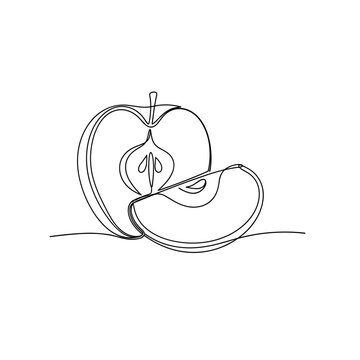 Fresh apple cut in half with slice and visible seeds