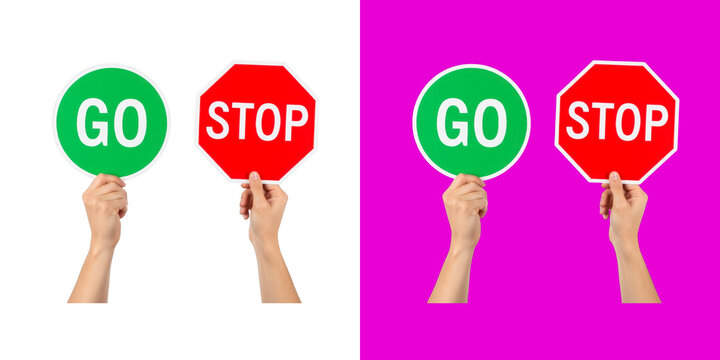 Human hands holding green go and red stop signs for direction transparent png