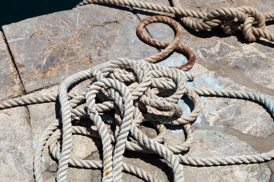 A long rope piled up in the harbor, Symi Island.