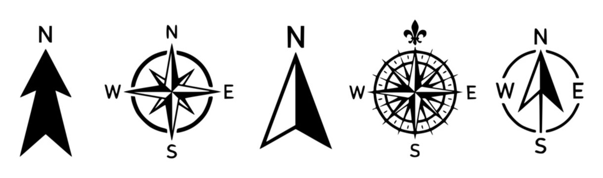 Set of five different north arrow symbols and compass rose set with simple line art design featuring outline, illustration, graphic elements with clean design and vector art
