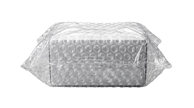 Protective bubble wrap package, wrapped cardboard box parcel, clear plastic bubble wrap packaging, secure logistics shipping container isolated PNG with Transparent Background