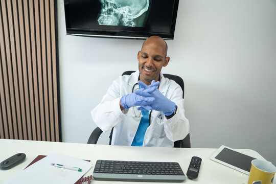 Male doctor preparing medical exam in clinic office