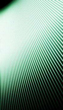 Abstract green beams of light radiating diagonally