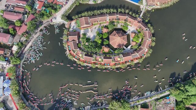 Festival boats around Tam Coc waterfront during the Tam Coc festival in Ninh Binh, Vietnam