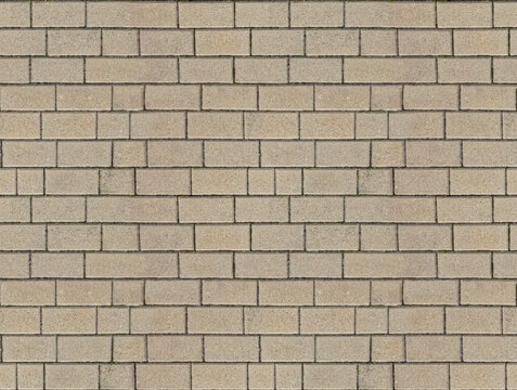 Seamless paving slabs. A seamless texture of plain grey rectangular concrete paving blocks. Pavement with interlocking textured bricks pattern. Pathway texture top view. Outdoor concrete slab sidewalk
