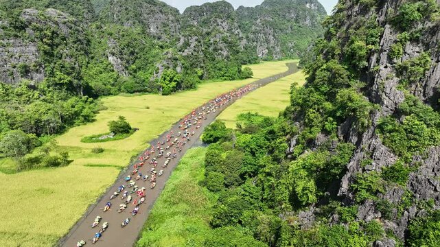 Tam Coc festival river beside limestone cliff during the Tam Coc festival in Ninh Binh, Vietnam