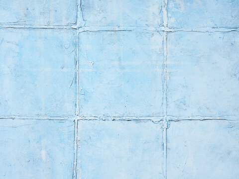 Pale blue textured wall with a rustic finish, perfect for food and beverage backgrounds in modern menu design