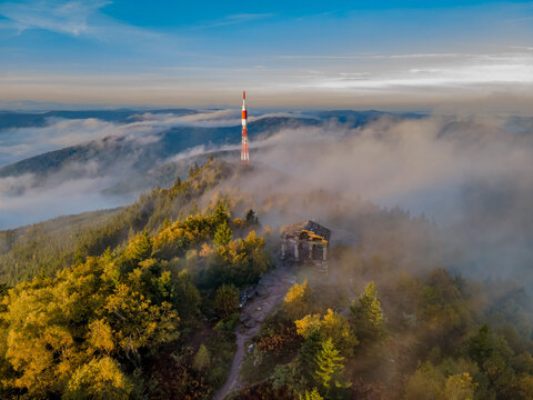 FRANCE. ALSACE. BAS-RHIN 67 GRANDFONTAINE. AT THE SUMMIT OF DONON, THE TEMPLE STANDS OUT IN THE AUTUMN MIST, OFFERING A MYSTICAL SILHOUETTE IN THE HEART OF THE VOSGES MOUNTAINS.