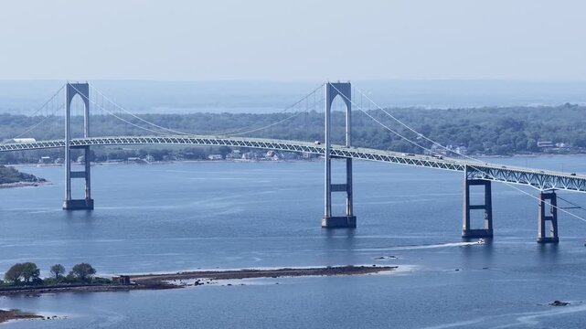 Newport, Rhode Island, USA - aerial view of harbor, sailboats and Claiborne Pell Bridge on a clear day. g.