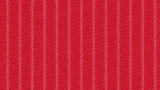 Dynamic red background animation featuring seamless vertical pinstripes with a textured, motion blur effect for abstract, energetic visual design.