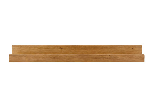 Simple light brown wooden picture ledge shelf, designed for modern home decor, isolated on a clean white background