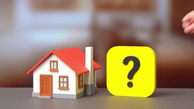 A house and a question mark. What you need to know about building a house. Questions about choosing a home design. Construction planning guide, architectural decisions