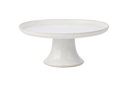 Elegant white ceramic cake stand with a smooth glazed finish and subtle texture on a clean background