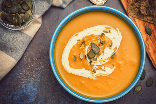 Fresh hot homemade pumpkin soup with cream