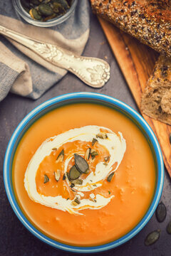 Fresh hot homemade pumpkin soup with cream