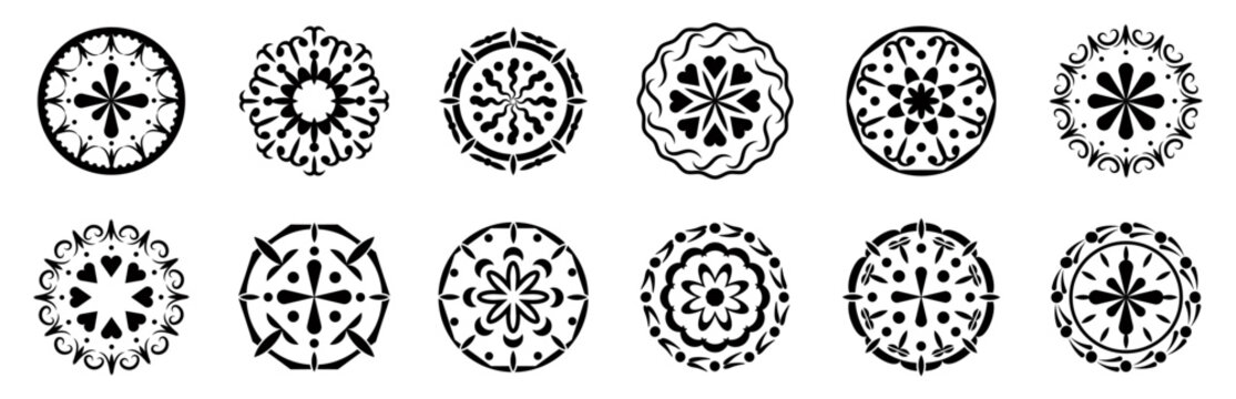 Decorative circular ornament collection with symmetrical floral patterns, botanical motifs