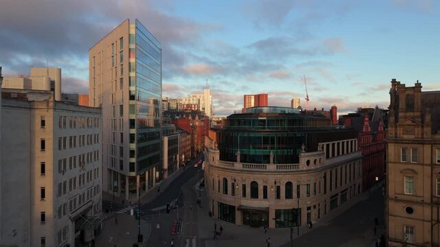 Aerial video of a Sunrise over Leeds City Square and Station Area