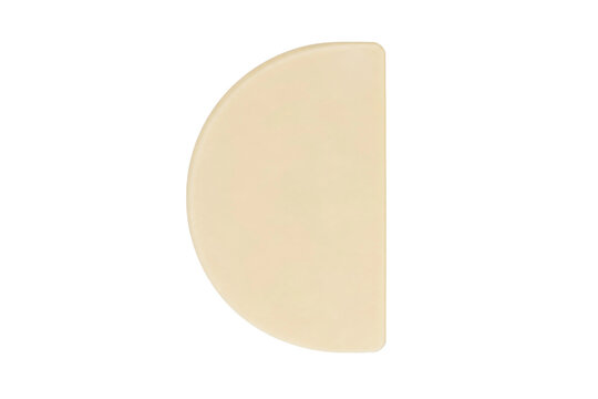 Single beige half-circle plastic scraper with a smooth surface is isolated on a clean white background