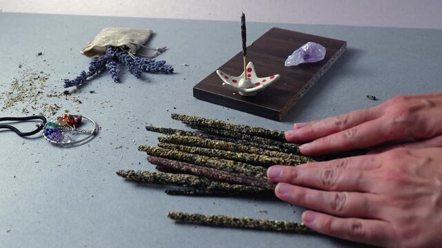 Hands Arrange Natural Incense Sticks for Meditation