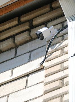 urveillance security camera video equipment on house wall outdoor