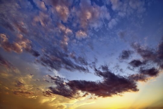 Atmospheric altocumulus cloud (Altocumulus) at sunset