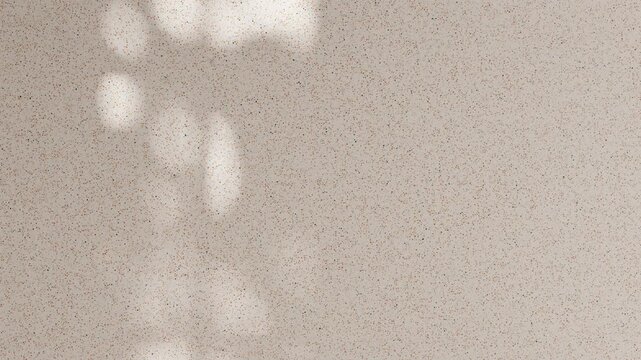 video footage of backdrop poster banner design, on a bare neutral-toned scene with bright white color