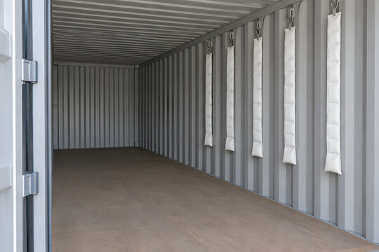 Cargo Desiccant Strips Installed Inside a Shipping Container to Prevent Condensation and Moisture Damage