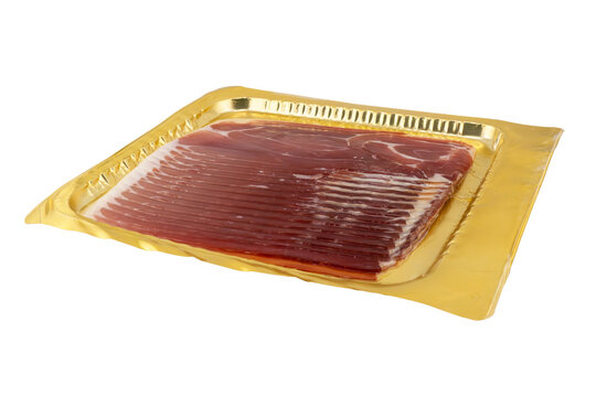 Jamon serrano. A Spanish ham isolated on white background. Traditional spanish jamon sliced. Dry cured meat ham. Hamon iberico