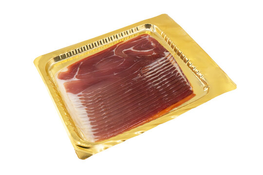 Jamon serrano. A Spanish ham isolated on white background. Traditional spanish jamon sliced. Dry cured meat ham. Hamon iberico