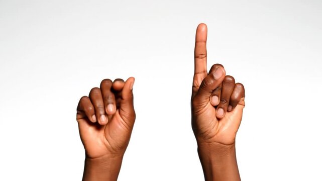 Black hand makes sign with finger up alongside another hand making a fist while pointing two fingers up