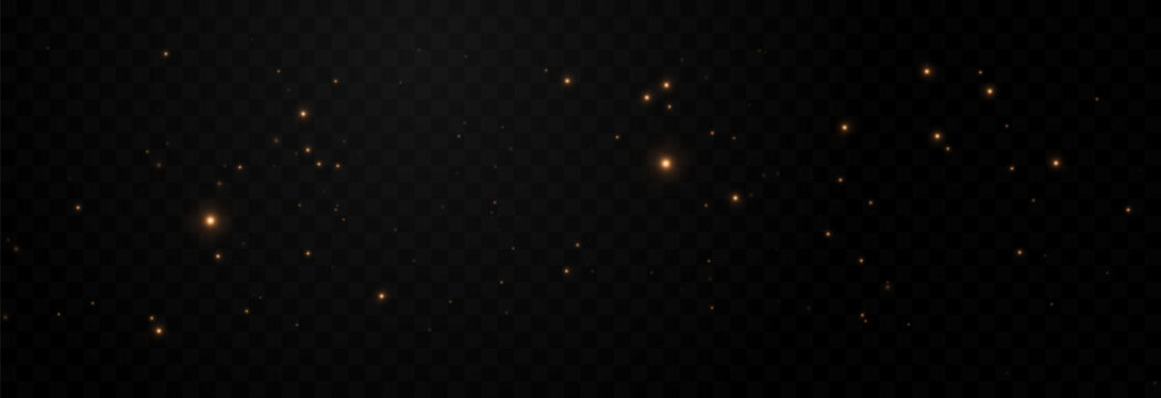 Golden glowing magic dust on a transparent background. Flying light particles PNG. Glowing dust PNG.