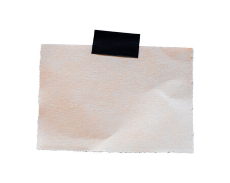 brown paper note with black duct tape isolated on white background