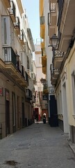 Narrow alleyway in Cadiz, Spain. © Michael