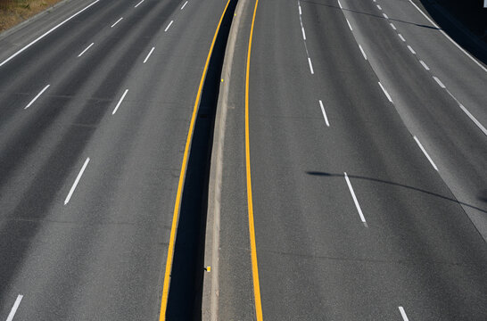 Highway in Canada. Top wiev on the Road. Road markings. Asphalt road.