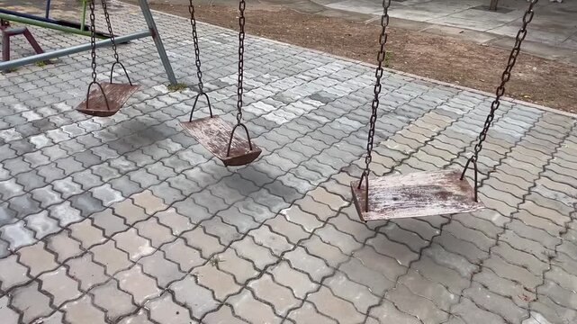 Swing wooden on the playground