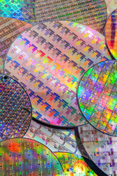 silicon wafer for manufacturing semiconductor of integrated circuit.Electronic circuit designs have been built onto the wafers using micromaching including photolithography