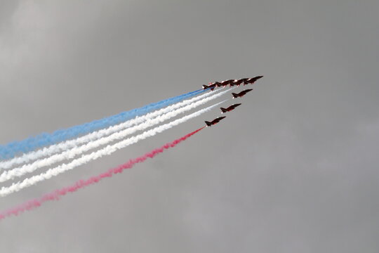Red Arrows Jet Formation Flying with Trailing Smoke