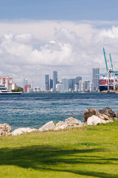 Modern skyline of Miami with towering skyscrapers, tropical vibe, and waterfront views