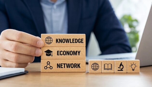 Professional holding wooden blocks representing knowledge economy and network concepts