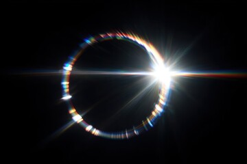 Fototapeta na wymiar A solar eclipse with a bright corona and colorful light flares.