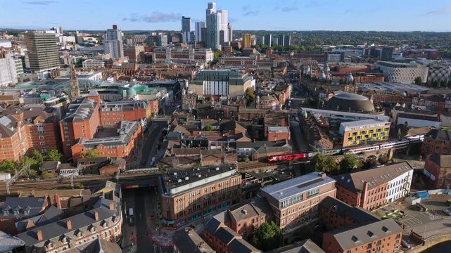Aerial Video of Train on Railway Viaduct and Leeds Skyline at Sunrise