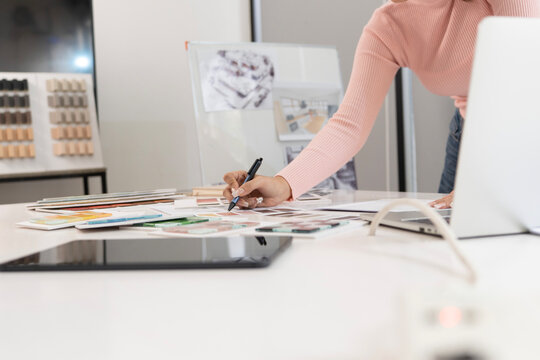 Creative web designer planning UI application and developing digital template