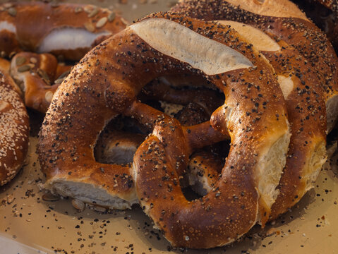 Freshly Baked Pretzels with Poppy Seeds on Plate