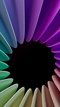 Colorful plastic forks arranged in a circular pattern