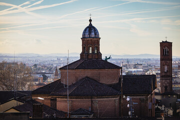Basilica di San Petronio dome with statue over Bologna cityscape © Michael Niehaus