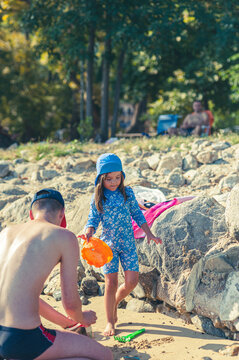 Father and Daughter Enjoying Quality Time Playing Together on the Beach