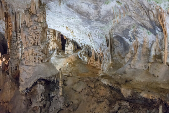 reflection of speleothemes in karstic river at Postojna cave, Slovenia