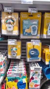 Royan, France - July 25, 2026: E.Leclerc ROYAN CEDEX. Colorful children's toys displayed on shelves in a retail store, featuring various characters and playful designs from Dada Bulle brand