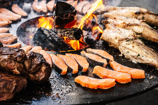 Whole Fish and Meat Grilling on Open Fire