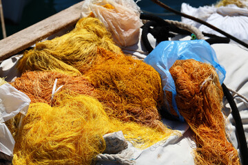 Fishing nets in the harbor of Symi Island, Greece. © matko